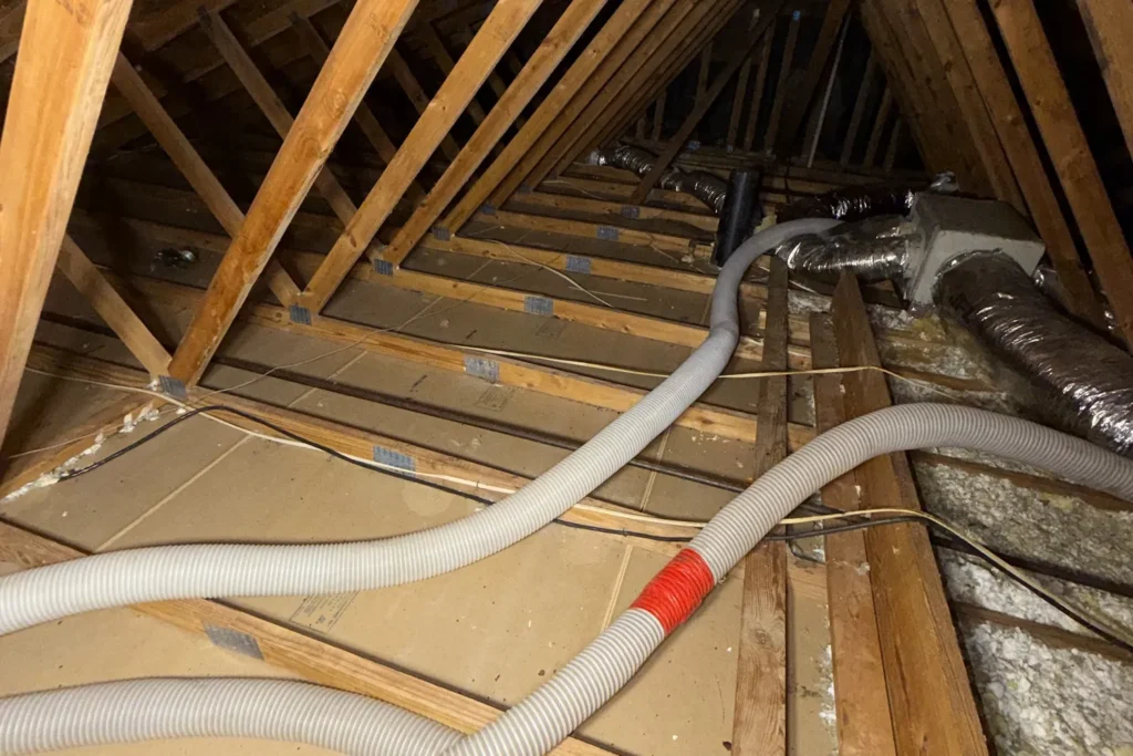 Blowing insulation into the attic – Attic Insulation Installation
