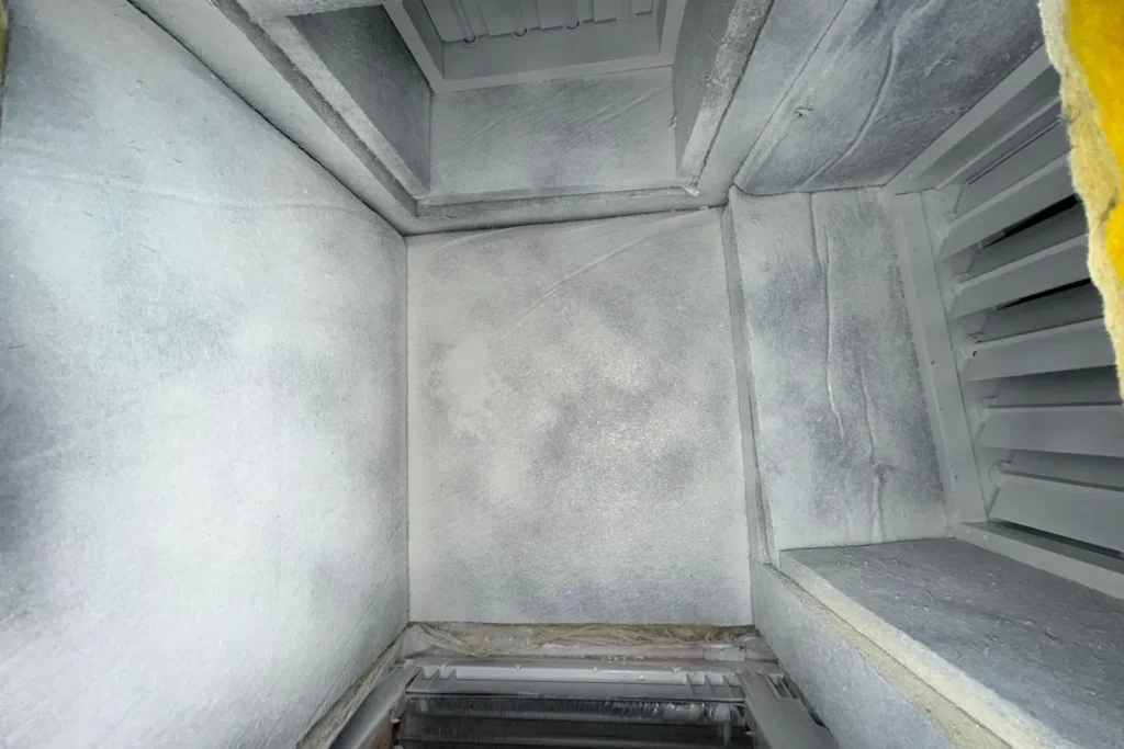Clean sheet-metal plenum after duct cleaning