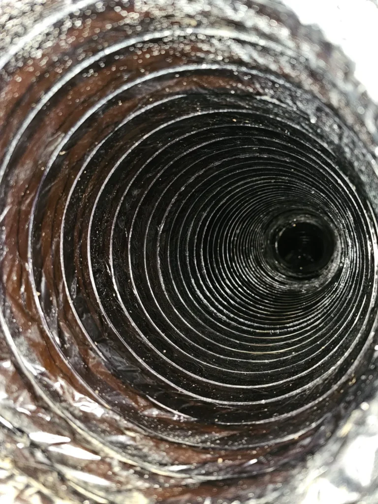 Dark build-up inside a flexible air duct