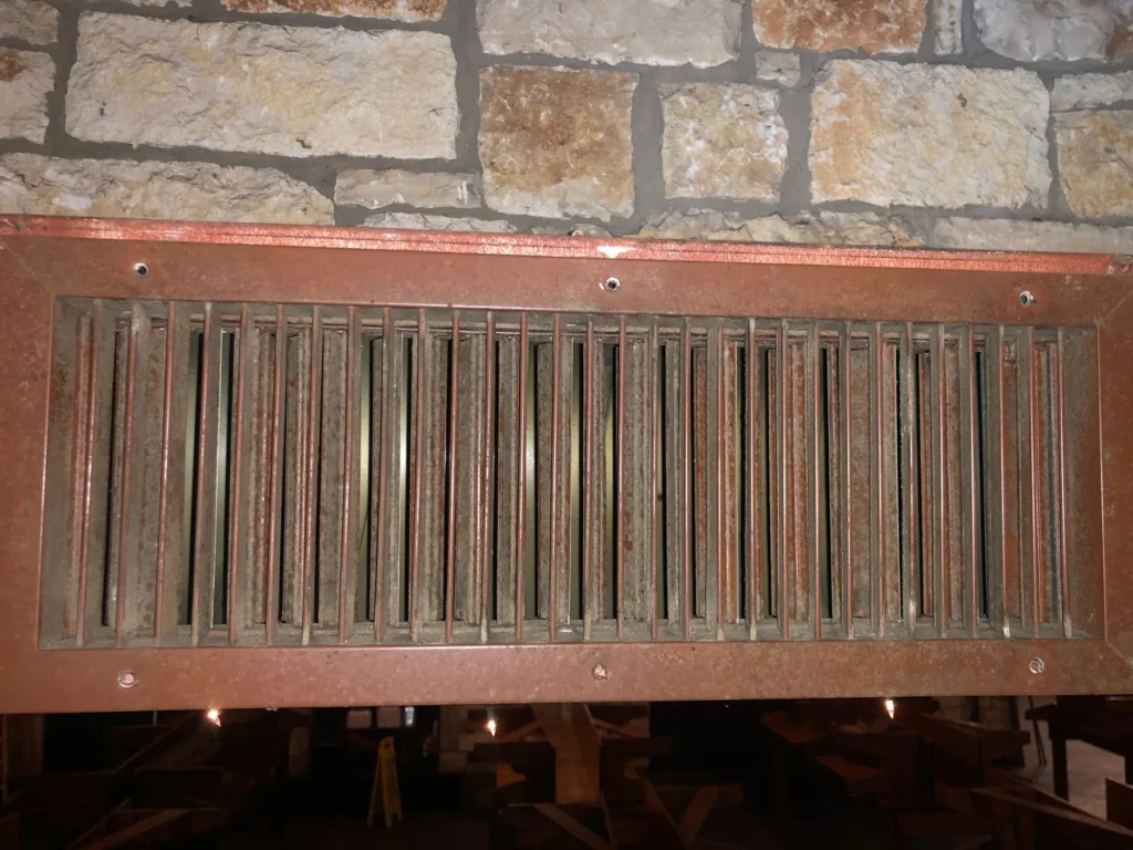 Linear supply grille in a commercial dining room