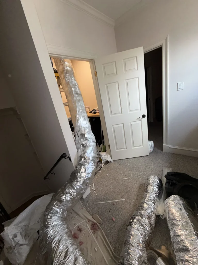 New flexible ducts laid out in a home during a remodel