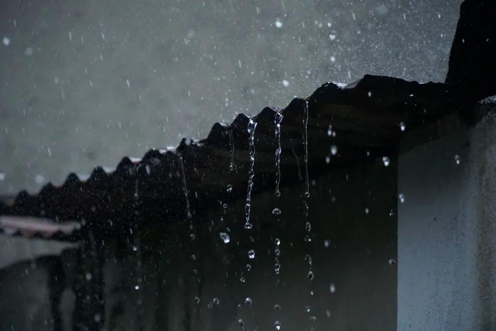 Rain running off a roof – Chimney Waterproofing